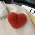 Cute fluffy faux rex rabbit fur heart hair tie in rust red color with a metal chain - Dusty Pink