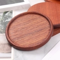 Round dark brown solid wood coasters with natural grain and recessed center design - Ebony Wood Round Grooved 8.8cm