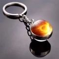 Double-sided glass moon keychain with golden sun nebula pattern and silver metal base - Sun
