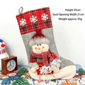 Gray felt Christmas stocking with snowman, red plaid cuff, and white snowflakes - Snowflake Style Snowman Stocking