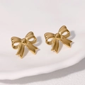 Orecchini a perno con fiocco dorato lucido su piatto in ceramica, gioielli donna - Oro