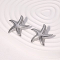Polished stainless steel starfish stud earrings in silver for ocean beach resort style - Steel