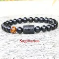 8mm Sagittarius zodiac stretch bracelet with black beads and tiger eye stone - Sagittarius