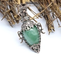 Detail of green crystal pendant with vintage copper filigree and engraved star pattern - Aventurine Jade