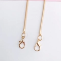 Detailed macro view of a 110cm golden metal snake chain strap with secure lobster clasps - 3.2mm Snake Chain (Gold) / 118cm