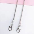 Detail of silver woven metal phone chain strap with lobster clasps on two-tone background - 3mm Foxtail Chain (Silver) / 110cm