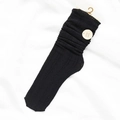 Calze a compressione nera da donna con motivo a treccia e bordi elasticizzati a volant - Taglia unica / Nero