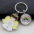 Metal rainbow angel keychain with Schulkind engraving on round glass pendant - Bright Yellow