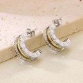Detail view of heart earrings with Roman numerals and rhinestones on stone background - Roman Numeral Inlaid (KE104553-K)