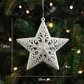 White glitter hollow star Christmas ornament with mandala pattern hanging on a festive tree - Five-pointed Star