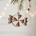 Wooden candy cane Christmas ornament with white swirl detail and festive string - Candy