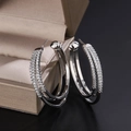 Elegant silver triple-row hoop earrings with sparkling pavé cubic zirconia inlay - Silver
