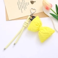 Portachiavi chic in pelle PU gialla con fiocco, chiusura a cuore e cordino coordinato - Giallo