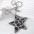 Portachiavi a stella con strass con motivo leopardato e chiusura in metallo argentato - Bianco