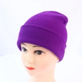 Detail of purple ribbed knit beanie showing high-stretch texture and warm folded cuff - One Size / Purple