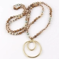 Detailed view of bohemian double-ring pendant with natural stone and crystal beads - Brown Cyan Series / Golden Double Ring