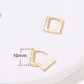 Detail shot of 10mm gold rectangular earrings with zircon inlay showing closed and open clasp - 10mm / Gold