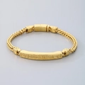 Golden Franco chain bracelet featuring a Greek key pattern on a rectangular center plate - Gold (KB184802-KJX)
