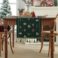 Christmas table runner in green fabric with festive woven patterns and gold tassel fringe - Yarn-dyed Dotted Christmas Pom-poms + Green Tassels (do Not Machine Wash)