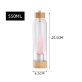 Detailed view of a 550ml glass water bottle with bamboo lid and pink crystal pillar - Rose Quartz