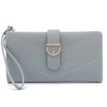 Detail view of light blue quilted leather wallet with V-pattern stitching and D-buckle - Blue