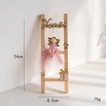 Pink Christmas angel figurine on wooden ladder with golden Xmas text and stars ornament - Pink Angel Girl Ladder