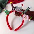 Dettaglio cerchietto natalizio con fascia di peluche, alberello e scritta Merry Christmas glitter - Albero di Natale Rosso