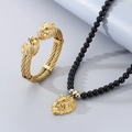 Golden double lion head cable bangle and black onyx beaded necklace with lion pendant - Bangle + Necklace Set
