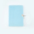 Light blue plush A5 notebook with secure metal lock and keys in minimalist style - Blue