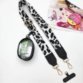 Detail view of leopard print crossbody strap with gold buckles and clear mini pouch attachment - White Light Grey Leopard Three-Piece Set - Gold Buckle