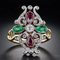Anello vintage a quadrifoglio bicolore con rubini rossi e smeraldi in filigrana - US 7 / Colorato