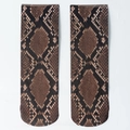Dettaglio calzini con stampa a serpente marrone e nero in tessuto elastico e ultra sottile - Snake Print
