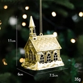 Golden Christmas church ornament with detailed spires and a hanging string for holiday decor - Little Castle