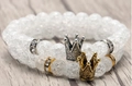 Set of two beaded bracelets with silver and gold crowns on white crackle beads - Set