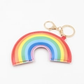 Detailed macro view of colorful PU leather rainbow keychain with golden lobster clasp - Large Rainbow