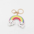Cute PU leather rainbow keychain with white clouds and golden lobster clasp on white background - Cloud Rainbow