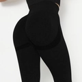 Detail van de naadloze yoga legging met hoge taille, scrunch butt en mesh textuur - S / Zwart