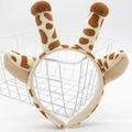 Plush giraffe antler headband with ears for Christmas parties on white background - Brown Giraffe