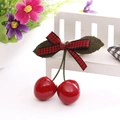 Cute cherry hair clip with red glossy finish, green felt leaves and red plaid bow - Red and Black Grid