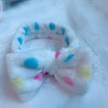 White coral fleece headband with colorful polka dots and a large soft plush bow - White Colorful Polka Dots