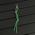 Detail of green nylon braided rope charm with reflective silk and silver metal carabiner - Dark Green