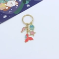 Detail of gold keychain with enamel seahorse, jellyfish, starfish and mermaid tail charms - Seahorse/Jellyfish/Starfish/Mermaid Tail