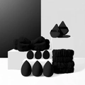 Macro shot of black makeup sponge set with plush bow headband and wristbands - Black 12-Piece Set