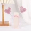 Close-up of pink glitter hearts on spring headband with soft light background - Pink Glitter Heart