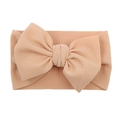 Infant wide headband with large bow in textured nude pink elastic fabric for babies - Blush