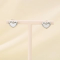 Macro detail of silver heart earrings with shell inlay on a professional jewelry stand - Heart Stud Style / Silver (KE98712-KLX)