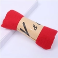 Red cotton linen scarf neatly rolled with a V&L brown paper ring holder on white surface - 160*50CM / Red