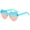 Rimless heart-shaped sunglasses with blue to orange gradient lenses and clear temples - Two-tone C17