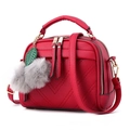 Red pebbled leather small crossbody bag with stylish faux fur pompom charm and top handle - Burgundy