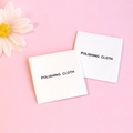 White microfiber polishing cloth for jewelry cleaning on a soft pink background - 5x5cm / White